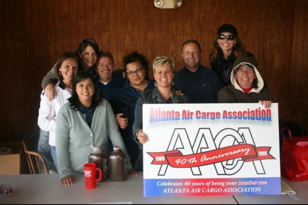 AACA members celebrating the association's 40th anniversary at an industry event