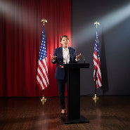 Speaker behind podium picture